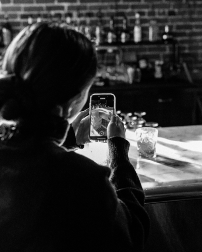 content creator taking picture of a drink